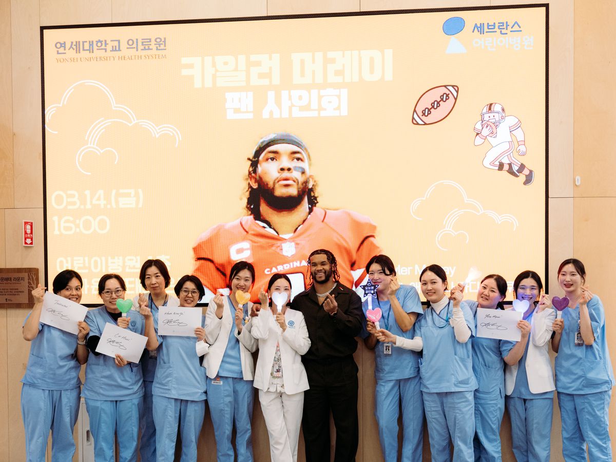Kyler with nurses at the hospital fan signing event