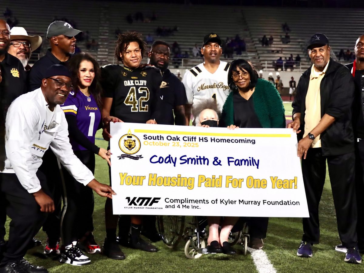 Cody Smith and family receive a year of paid housing at South Oak Cliff Homecoming, October 2025
