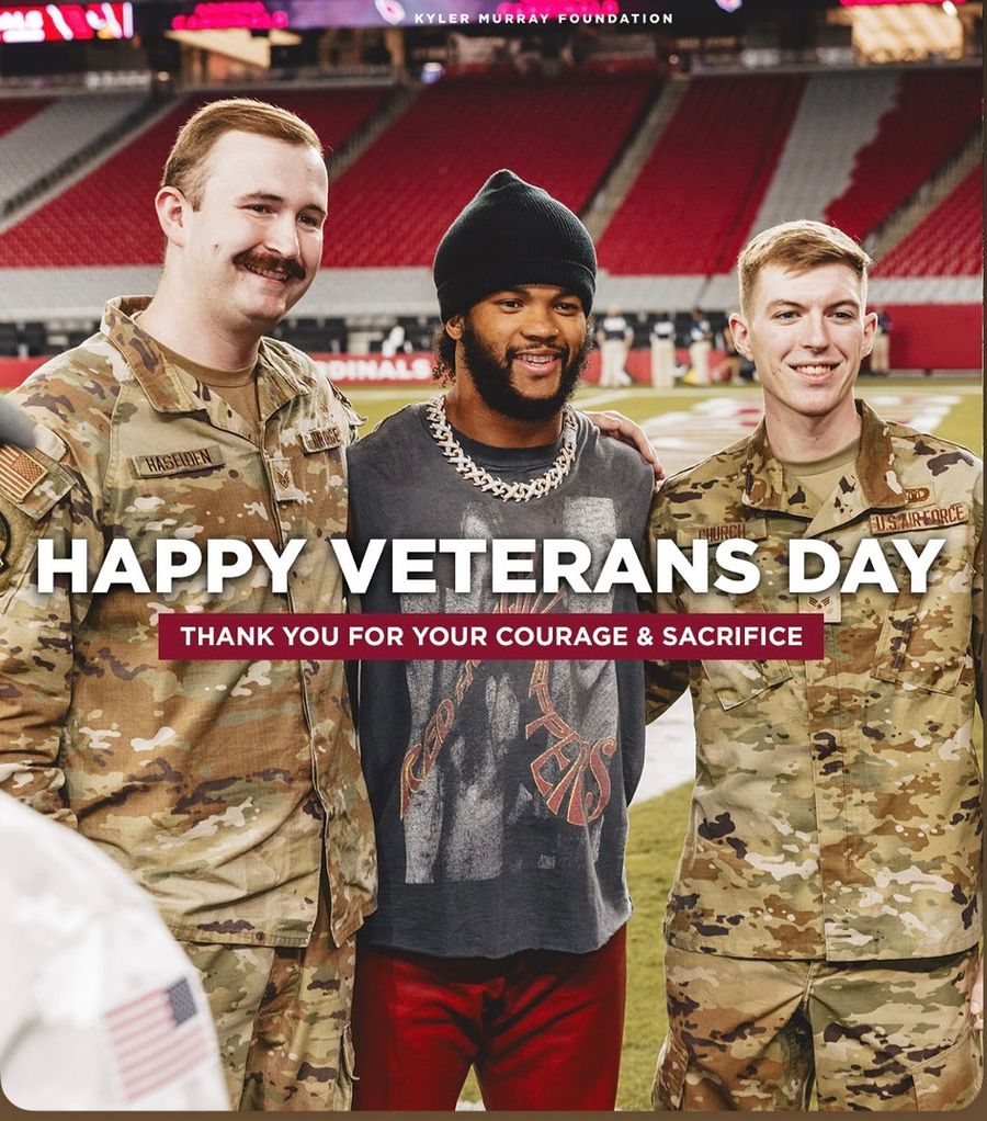 Kyler Murray with U.S. Air Force service members on Veterans Day